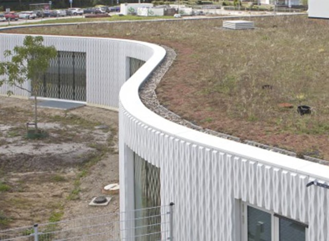 Rondgewalste of gesegmenteerde muurafdekkappen?